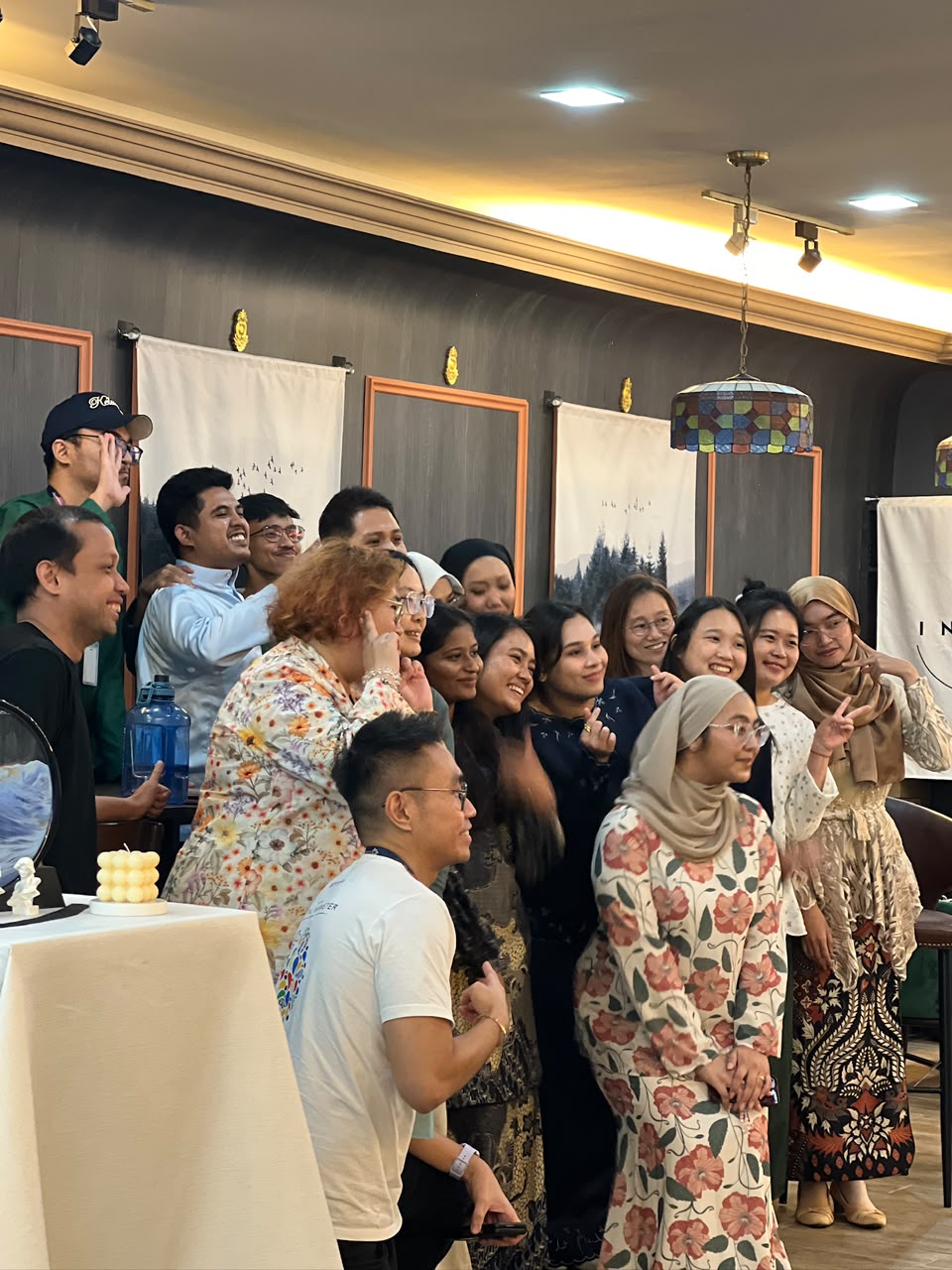 Guests gathered for a group photo at a networking event